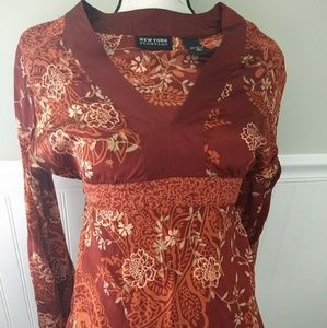 Silk top. Wide arms w/ waist tie